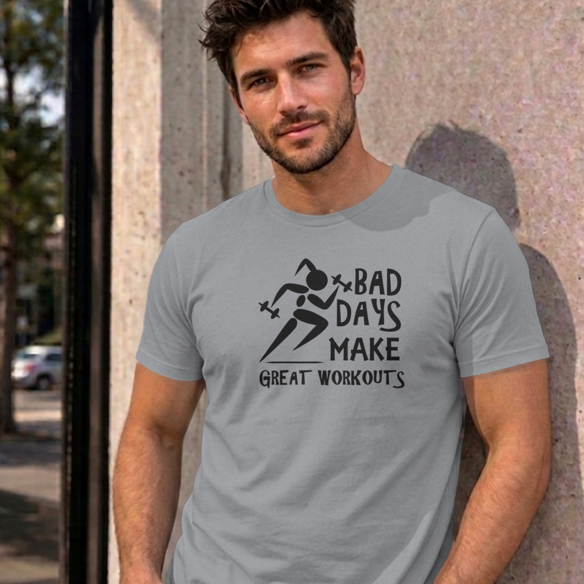 Man wearing the sport grey Bad Days Make Great Workouts graphic tee