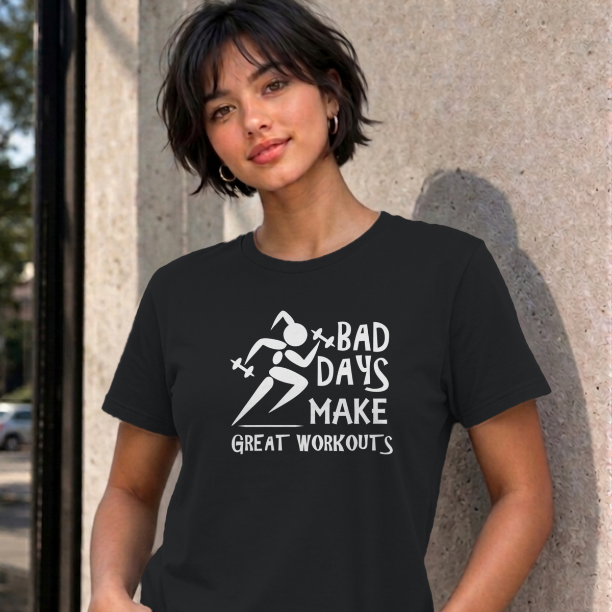 Woman wearing the black Bad Days Make Great Workouts graphic tee