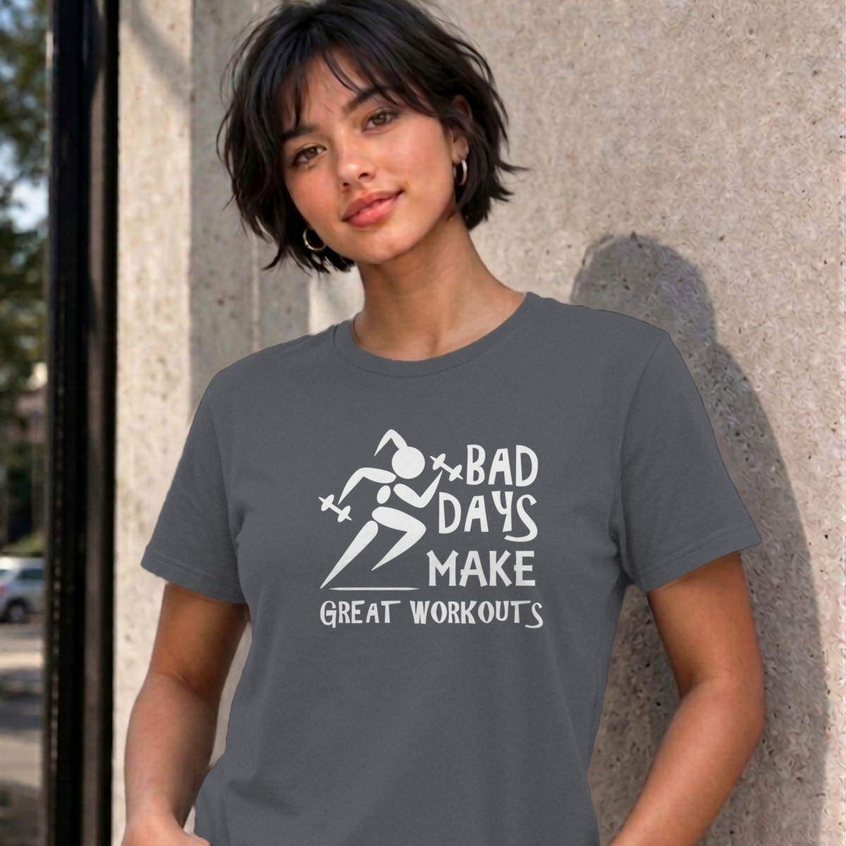 Woman wearing the charcoal Bad Days Make Great Workouts graphic tee