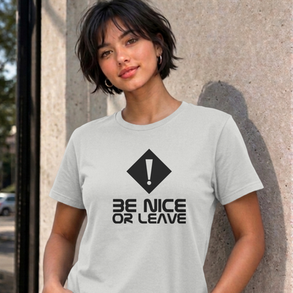 Woman wearing the ash Be Nice or Leave graphic tee