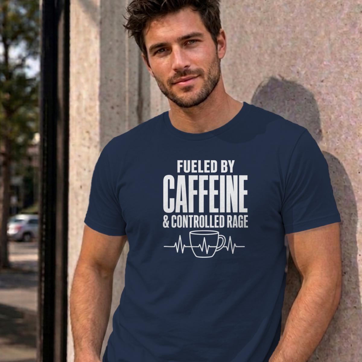 Man wearing the navy Nurse Caffeine graphic tee