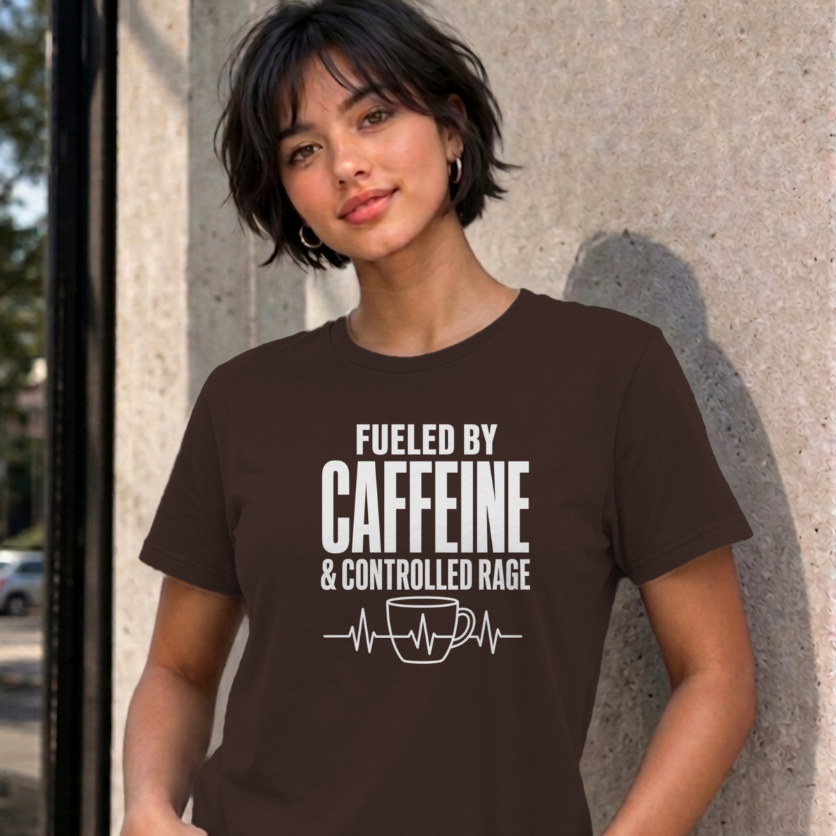 Woman wearing the dark chocolate Nurse Caffeine graphic tee