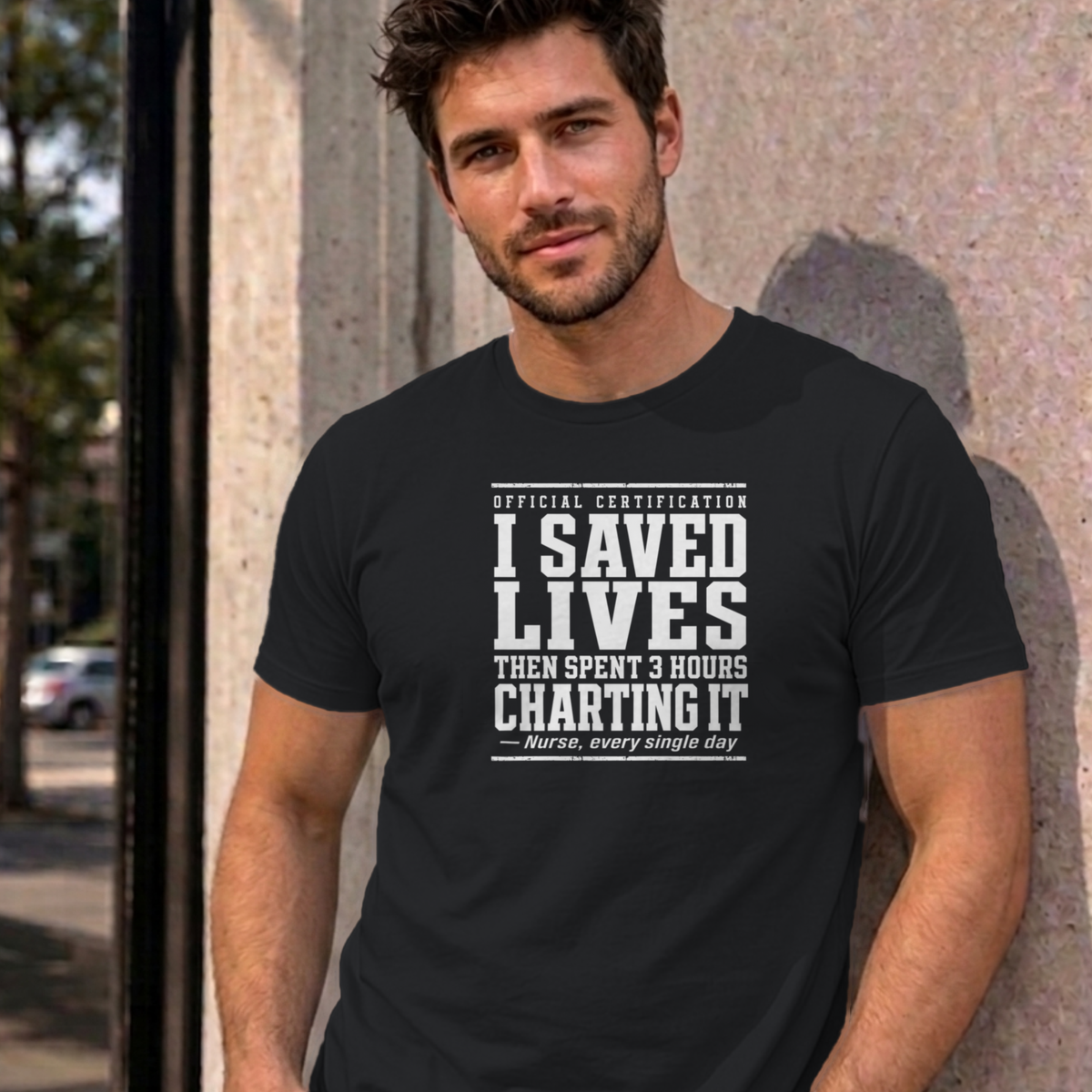 Man wearing the black Nurse Charting graphic tee