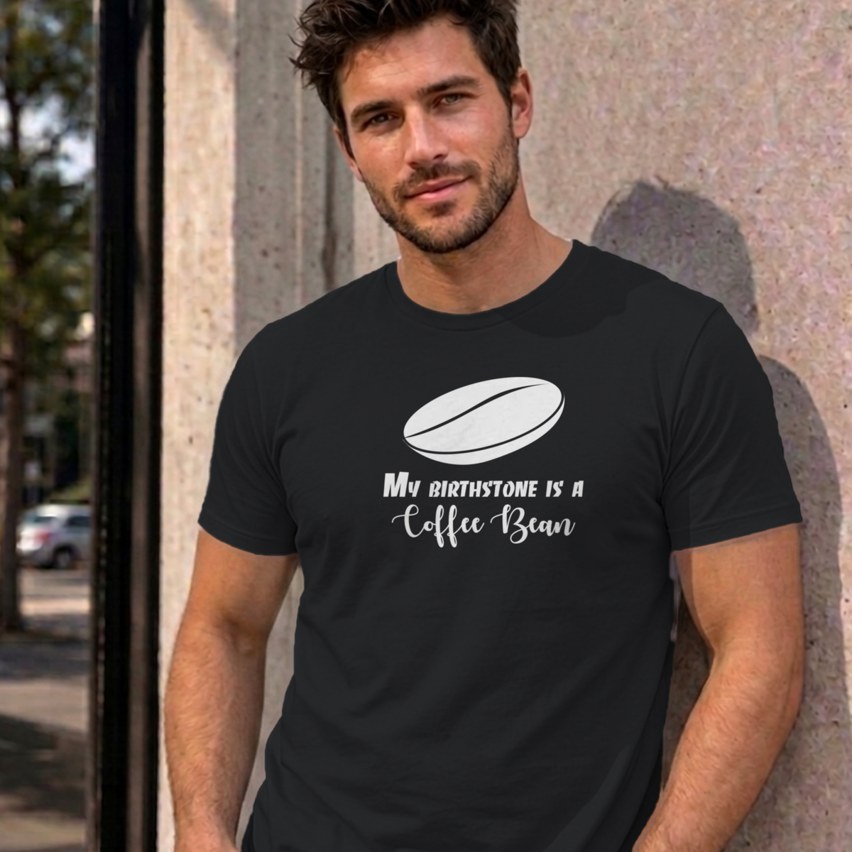 Man wearing the black My Birthstone Is a Coffee Bean graphic tee