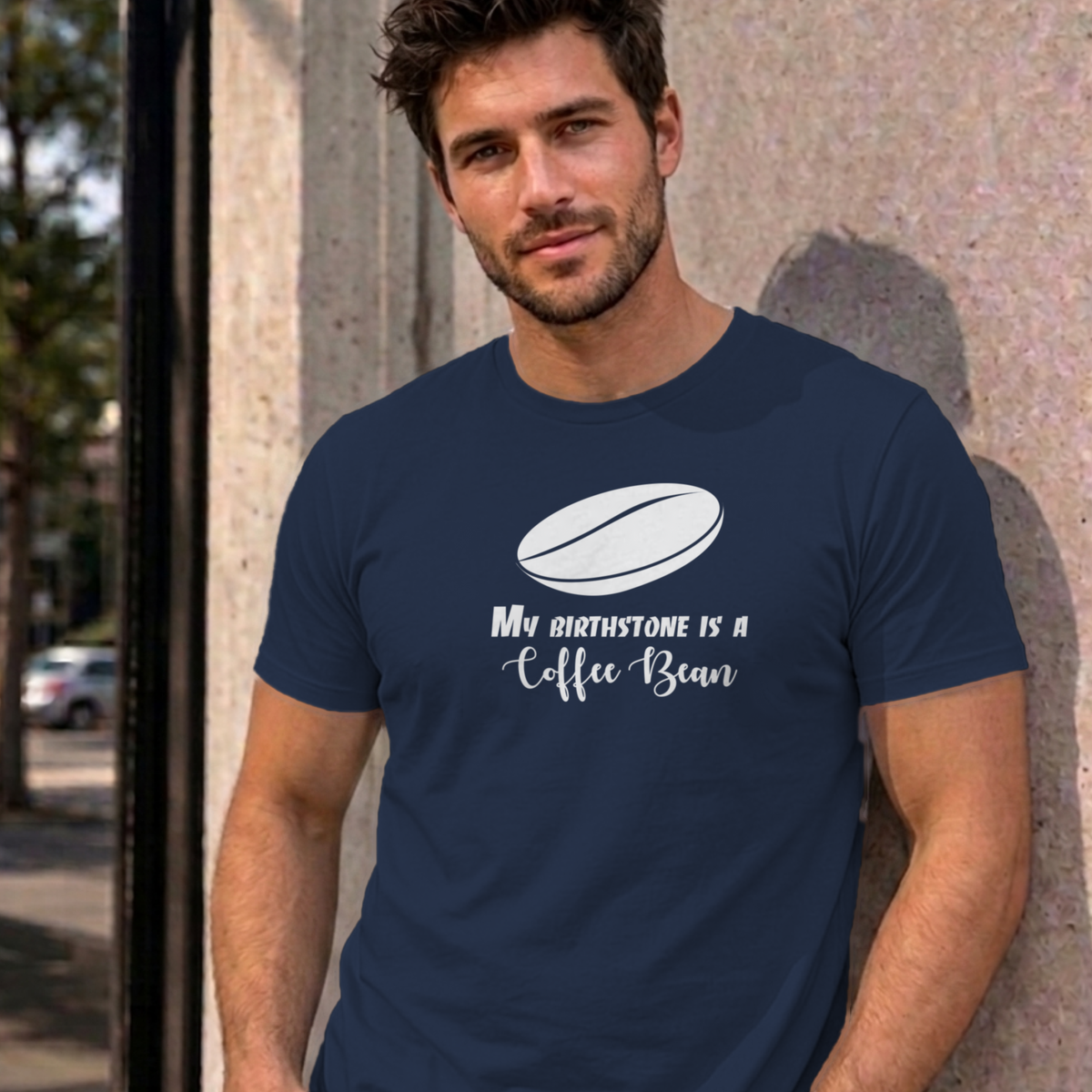 Man wearing the navy My Birthstone Is a Coffee Bean graphic tee