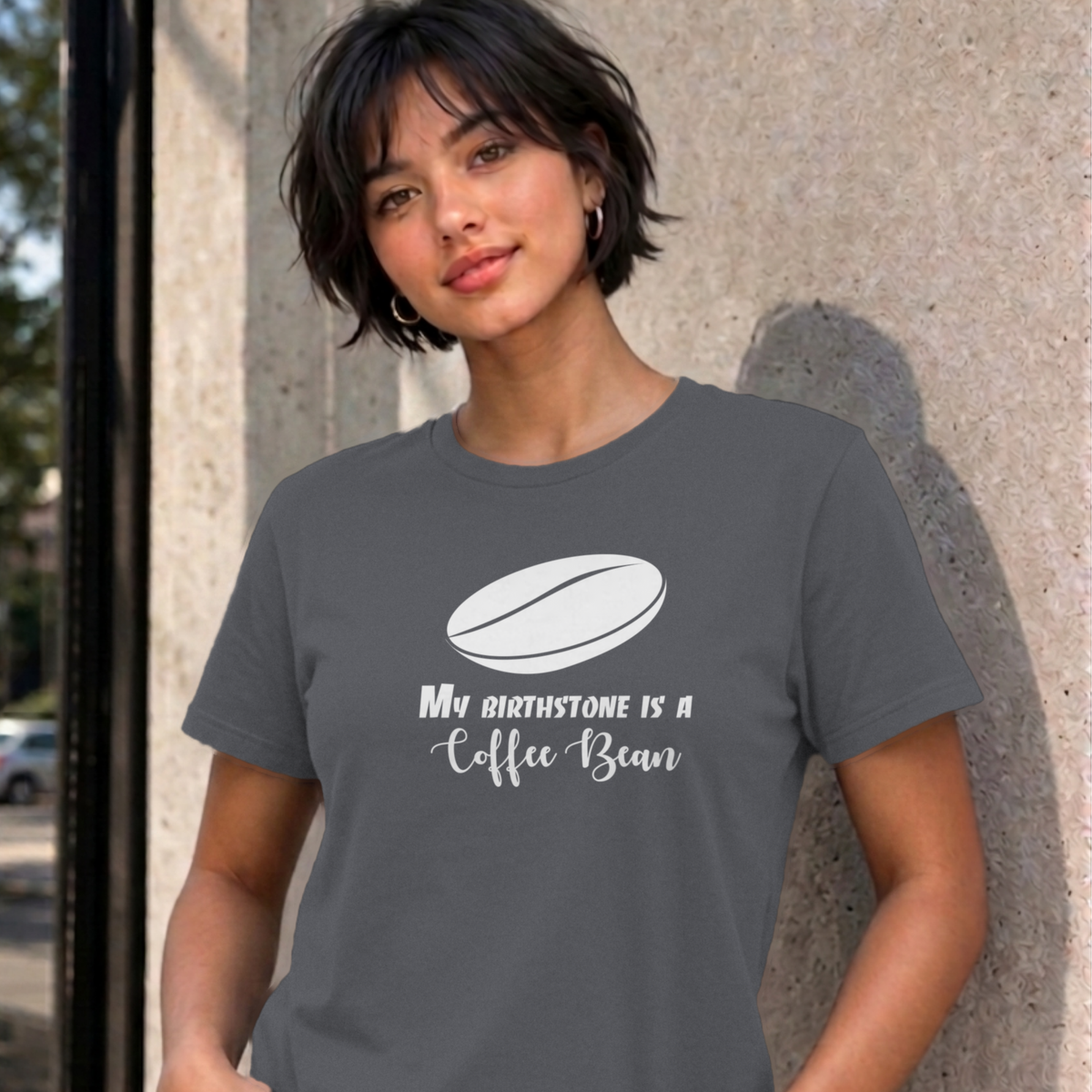 Woman wearing the charcoal My Birthstone Is a Coffee Bean graphic tee