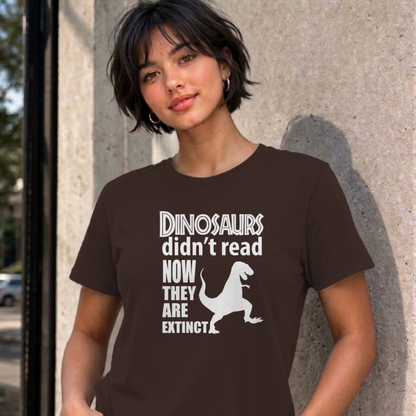 Woman wearing the dark chocolate Dinosaurs Didn't Read graphic tee