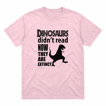 Dinosaurs Didn't Read graphic tee in light pink with black print, front view