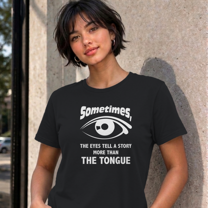 Woman wearing the black Eyes Tell a Story graphic tee