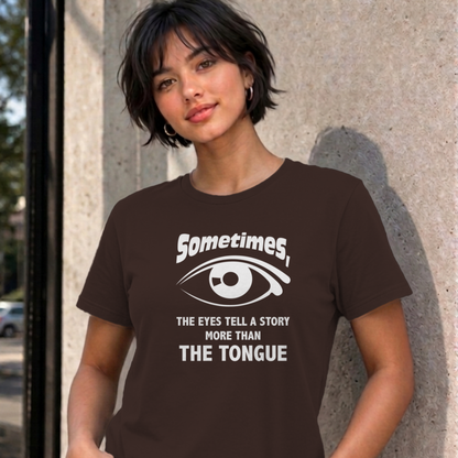 Woman wearing the dark chocolate Eyes Tell a Story graphic tee