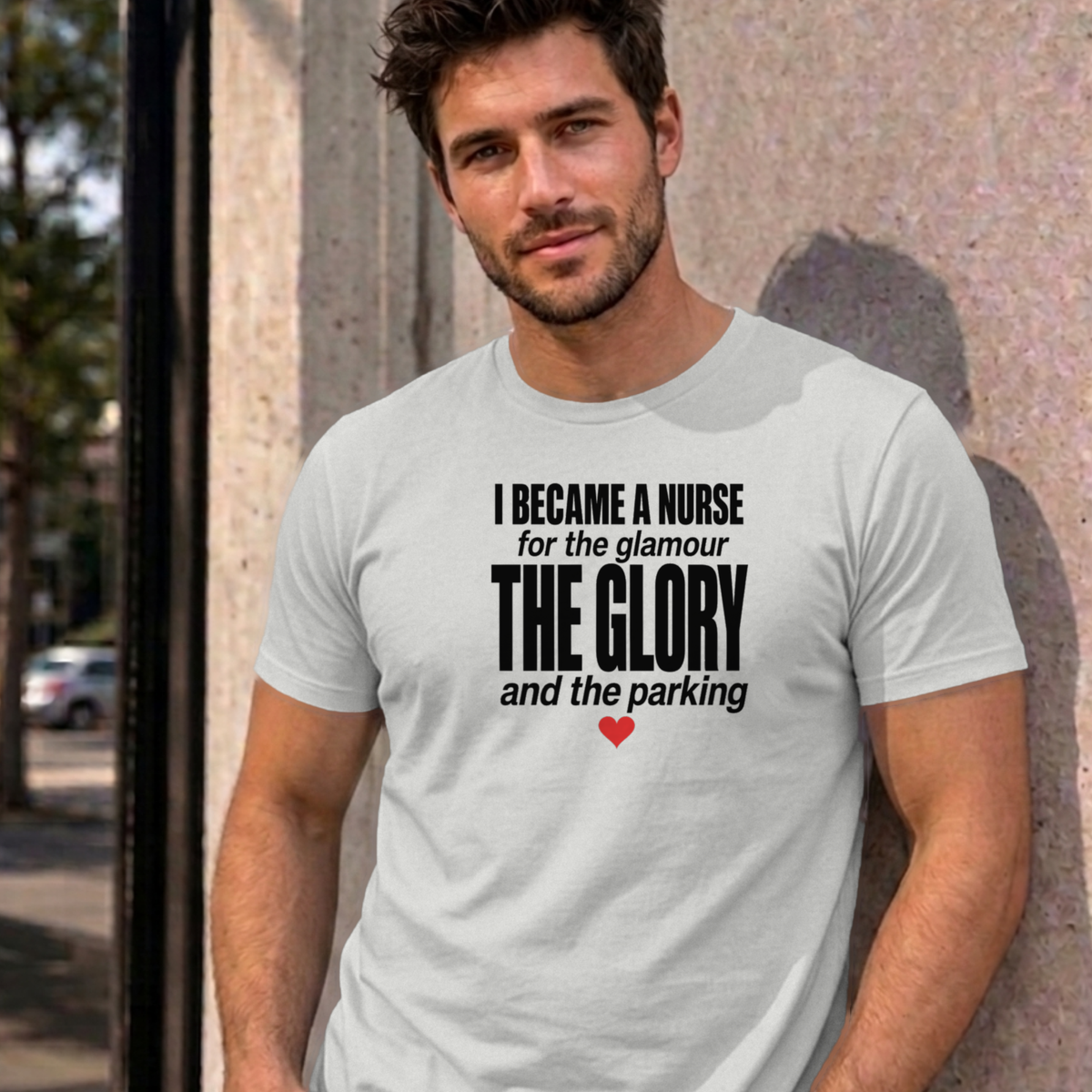 Man wearing the ash Nurse Glamour graphic tee