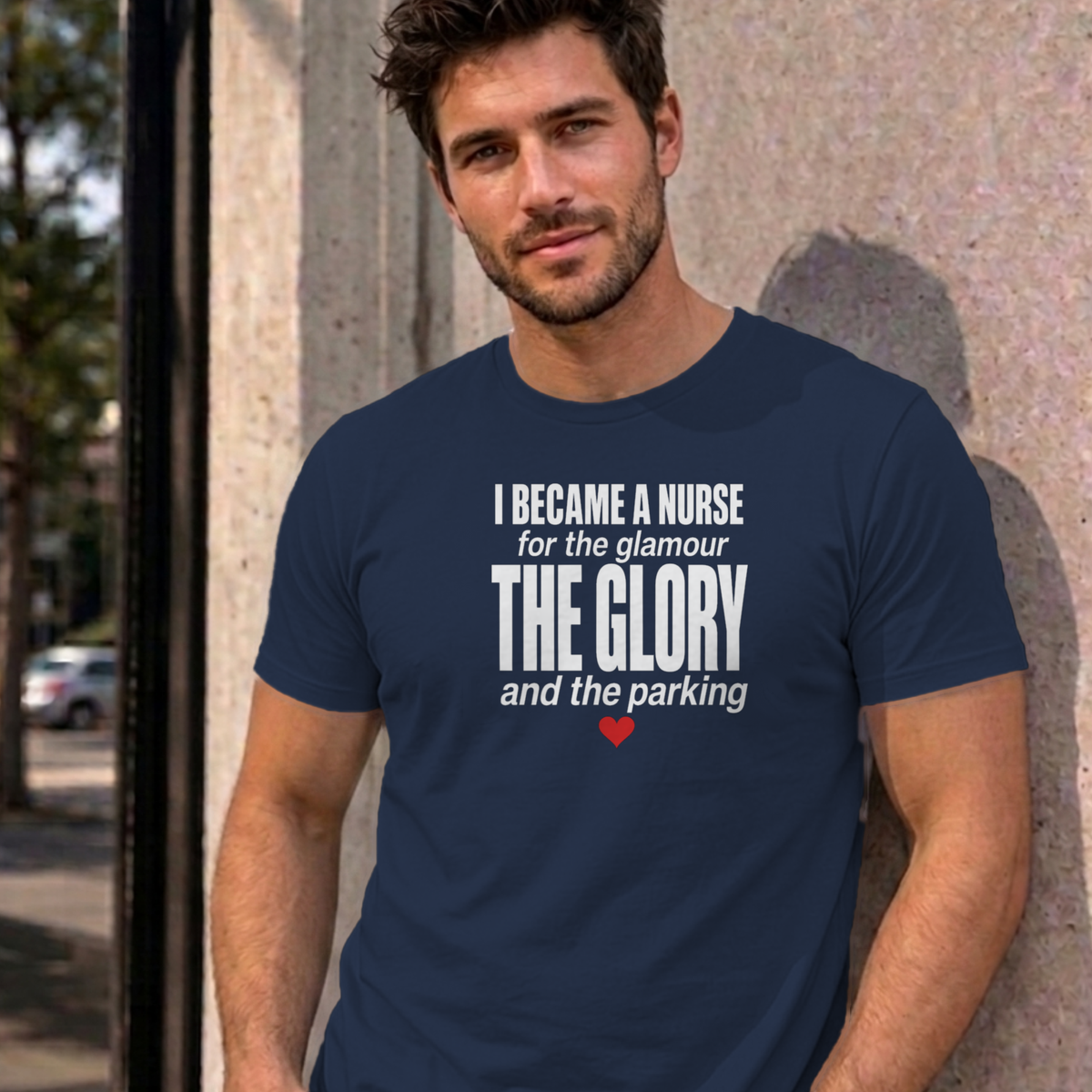 Man wearing the navy Nurse Glamour graphic tee