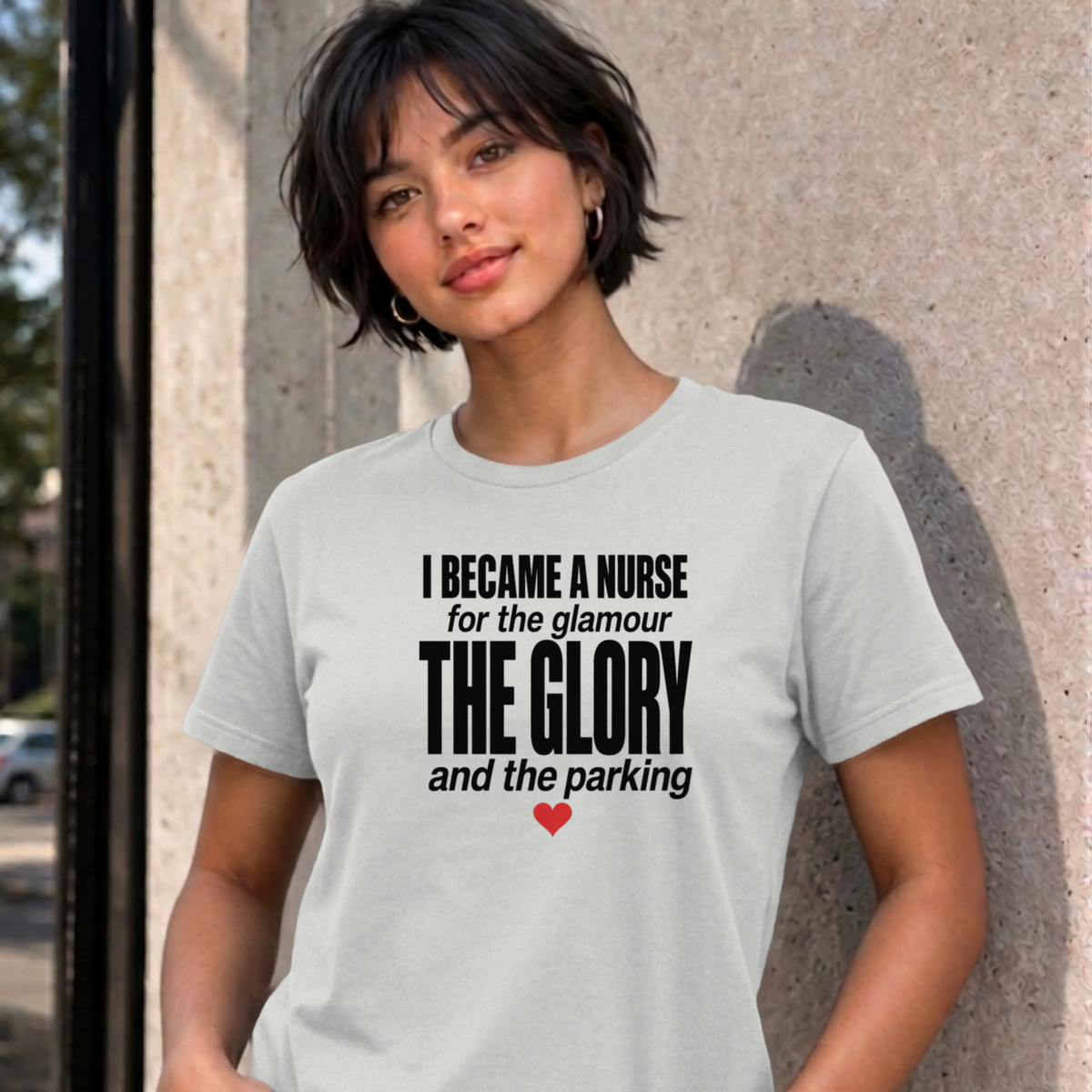 Woman wearing the ash Nurse Glamour graphic tee