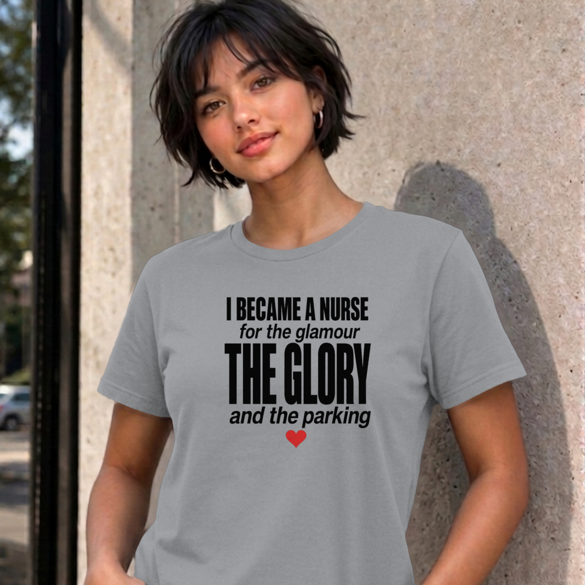 Woman wearing the sport grey Nurse Glamour graphic tee