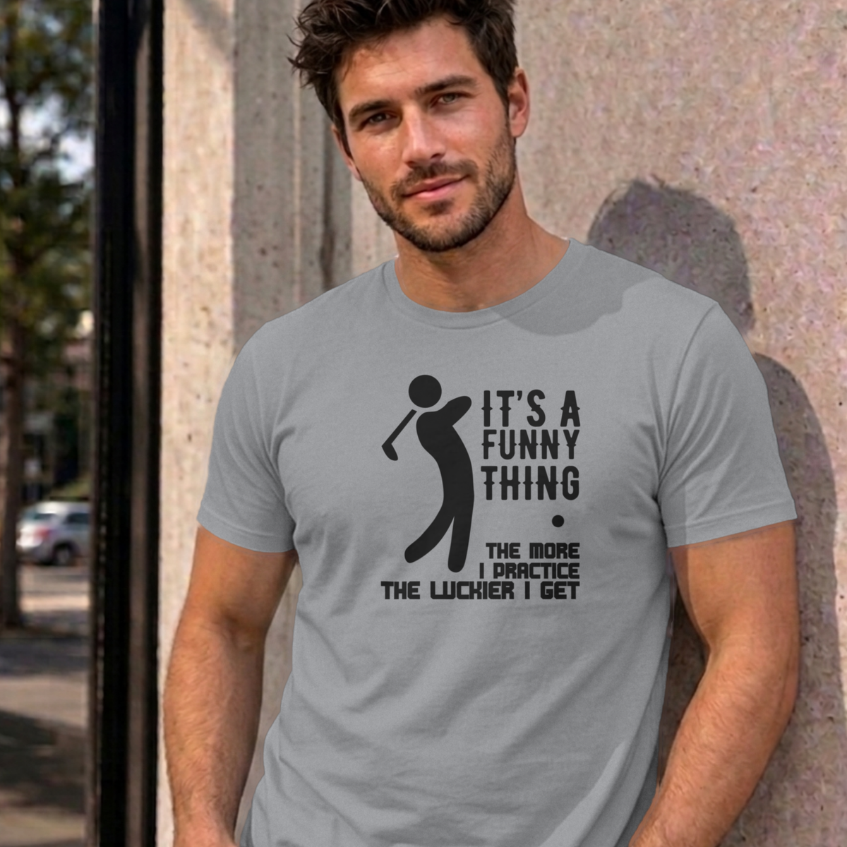 Man wearing the sport grey The More I Practice graphic tee