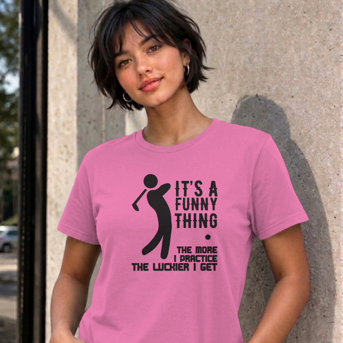 Woman wearing the azalea The More I Practice graphic tee
