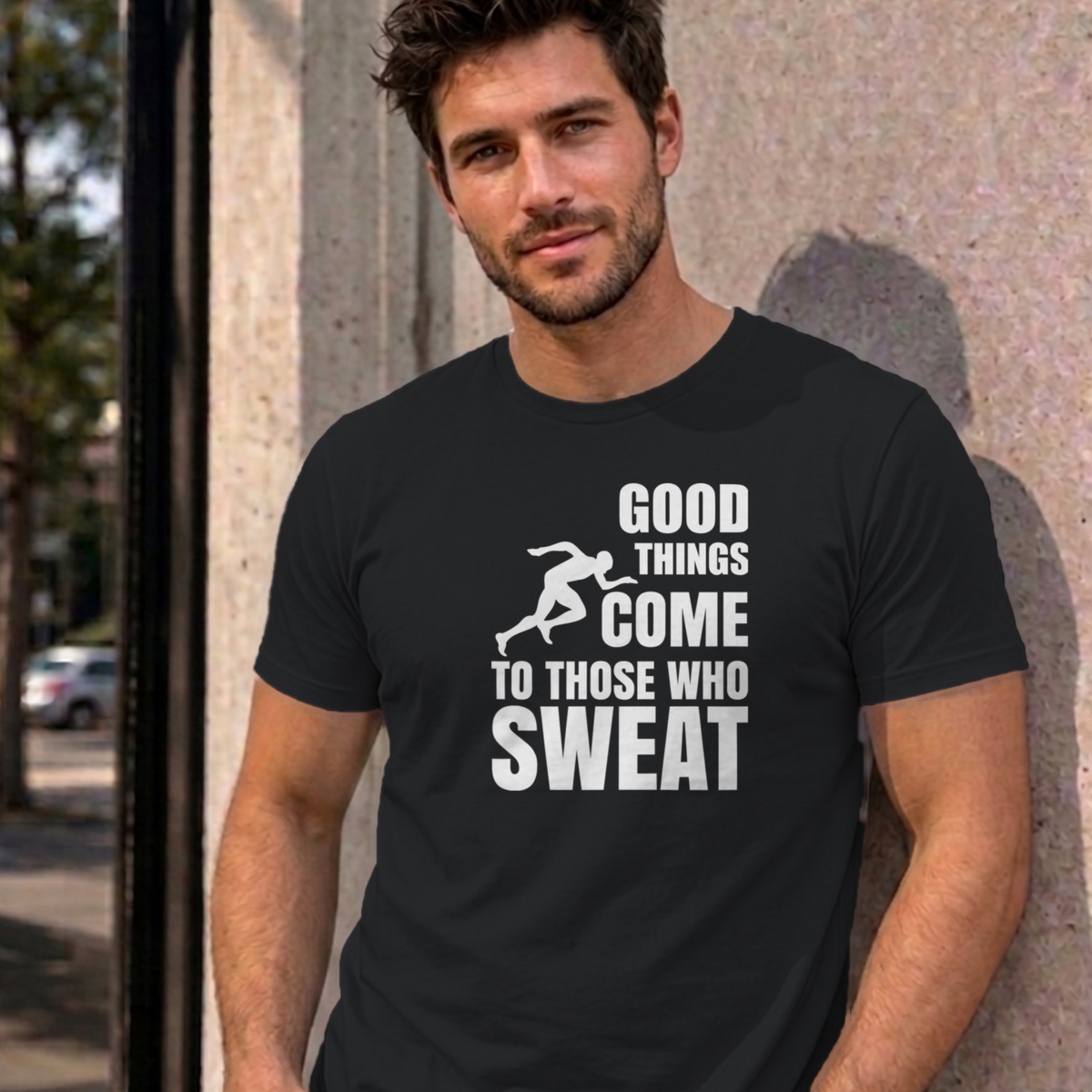 Man wearing the black Good Things Come to Those Who Sweat graphic tee