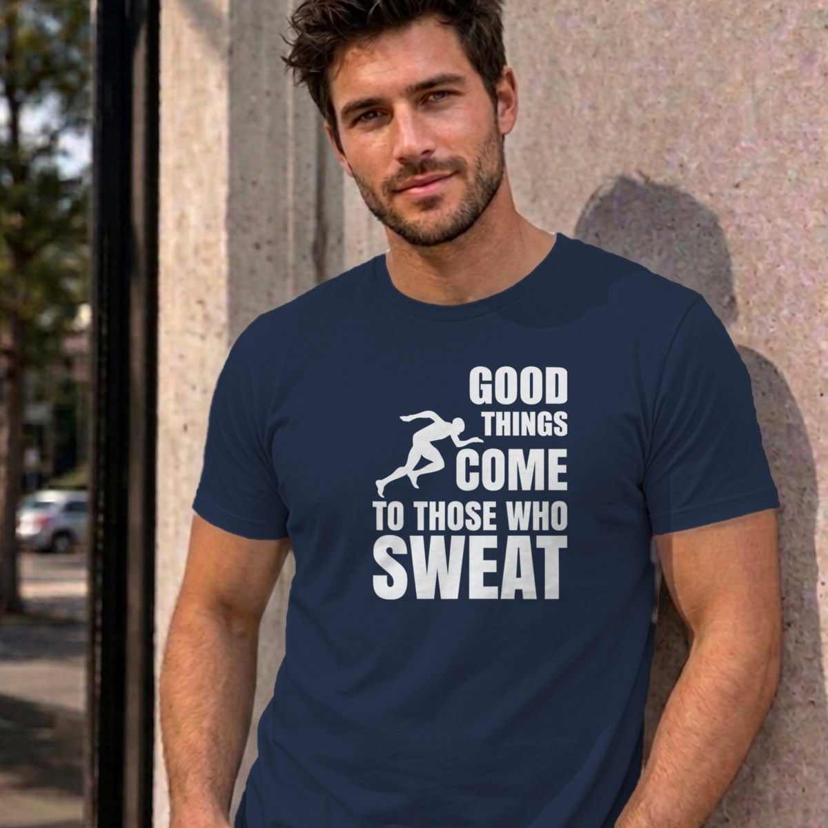 Man wearing the navy Good Things Come to Those Who Sweat graphic tee