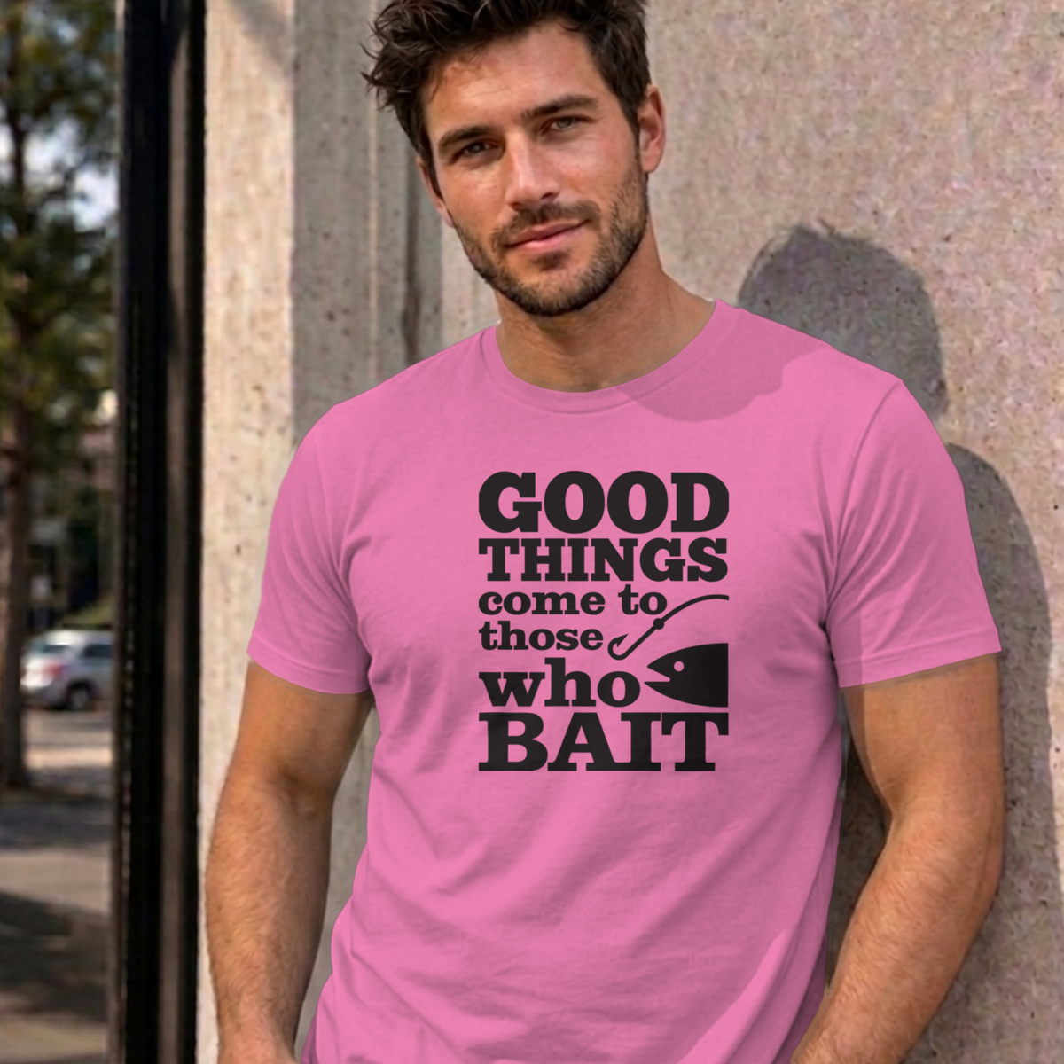 Man wearing the azalea Good Things Come to Those Who Bait graphic tee