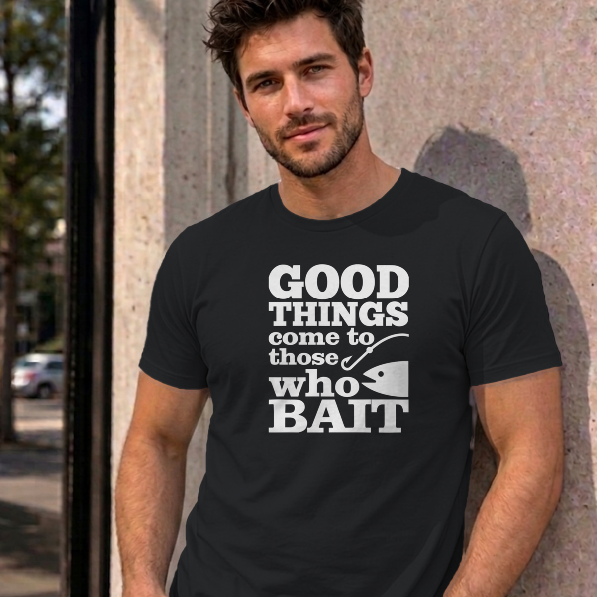 Man wearing the black Good Things Come to Those Who Bait graphic tee