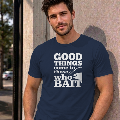 Man wearing the navy Good Things Come to Those Who Bait graphic tee