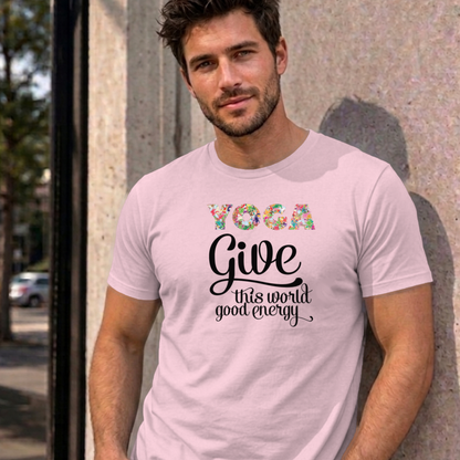 Man wearing the light pink Give This World Good Energy graphic tee