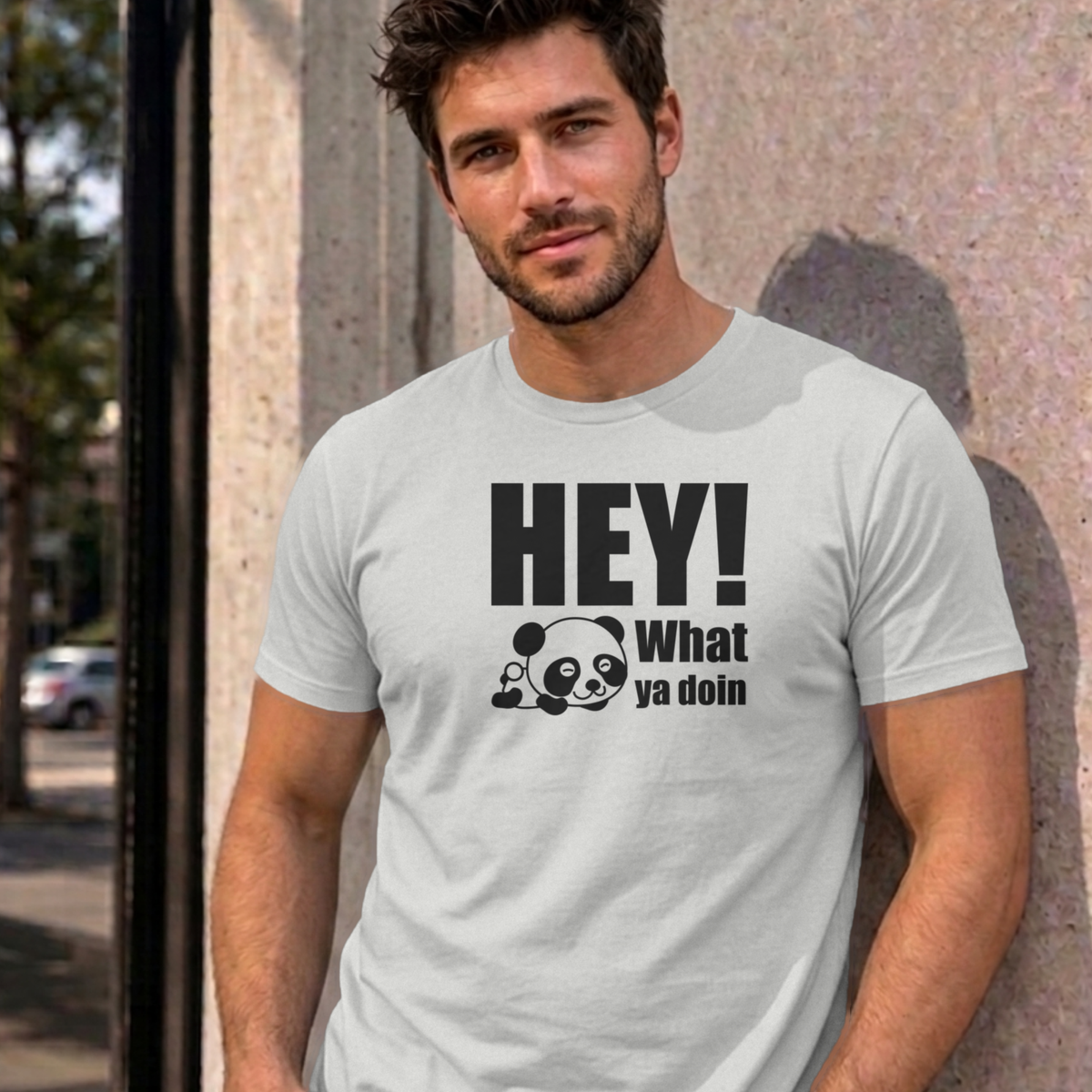 Man wearing the ash Hey! What Ya Doin graphic tee
