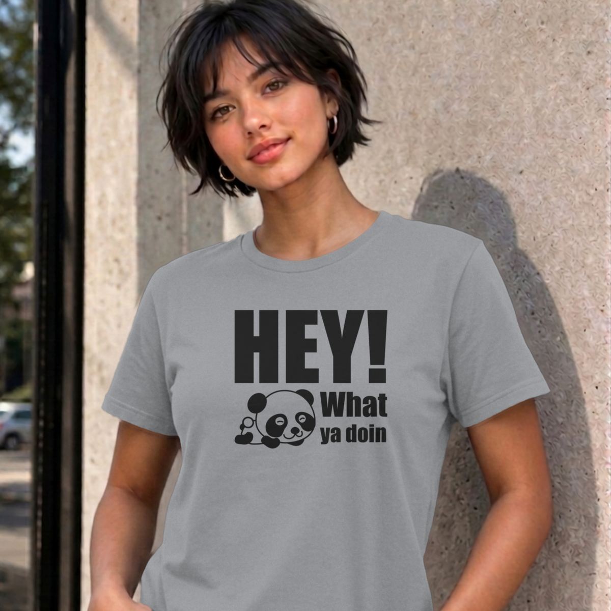Woman wearing the sport grey Hey! What Ya Doin graphic tee