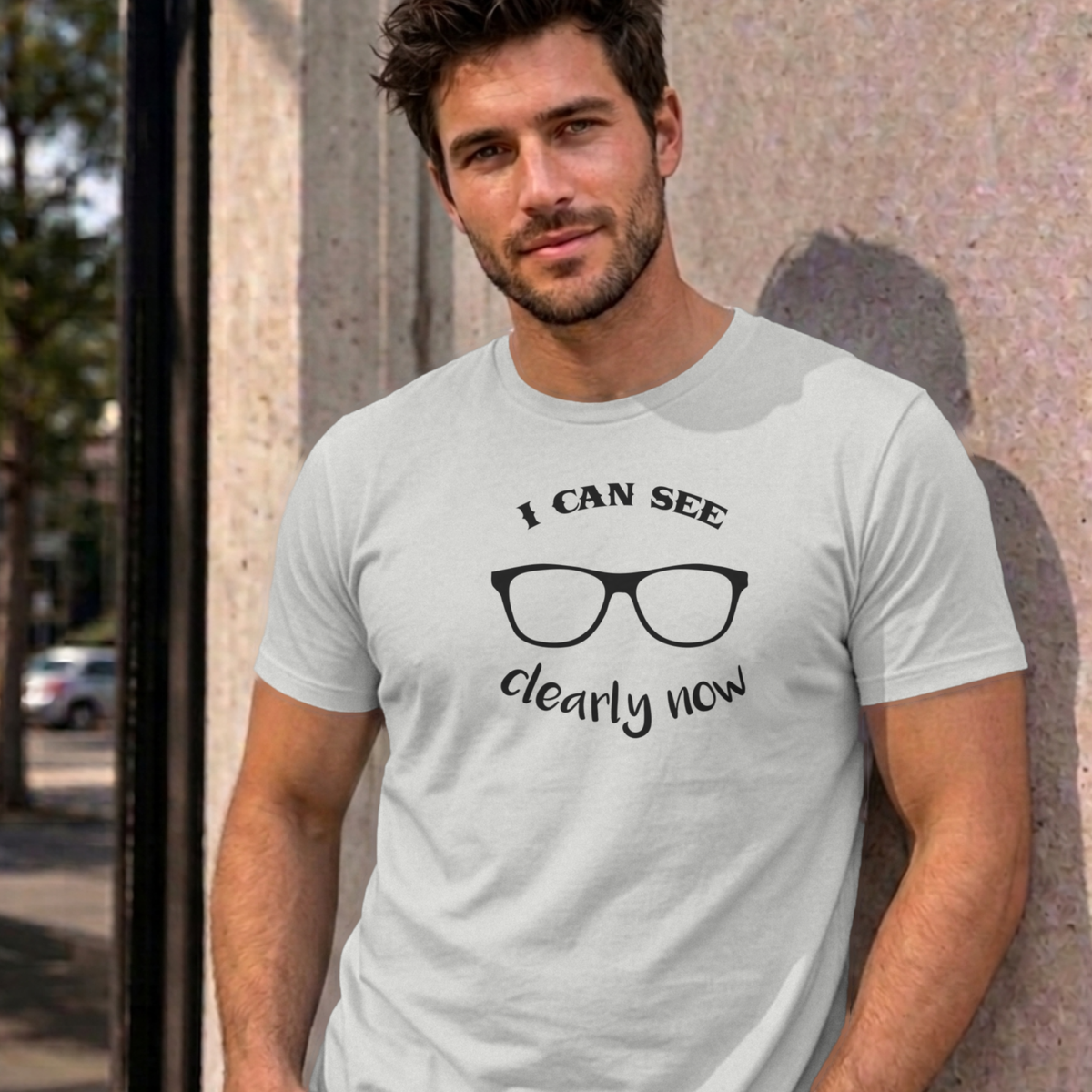 Man wearing the ash I Can See Clearly Now graphic tee