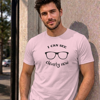 Man wearing the light pink I Can See Clearly Now graphic tee