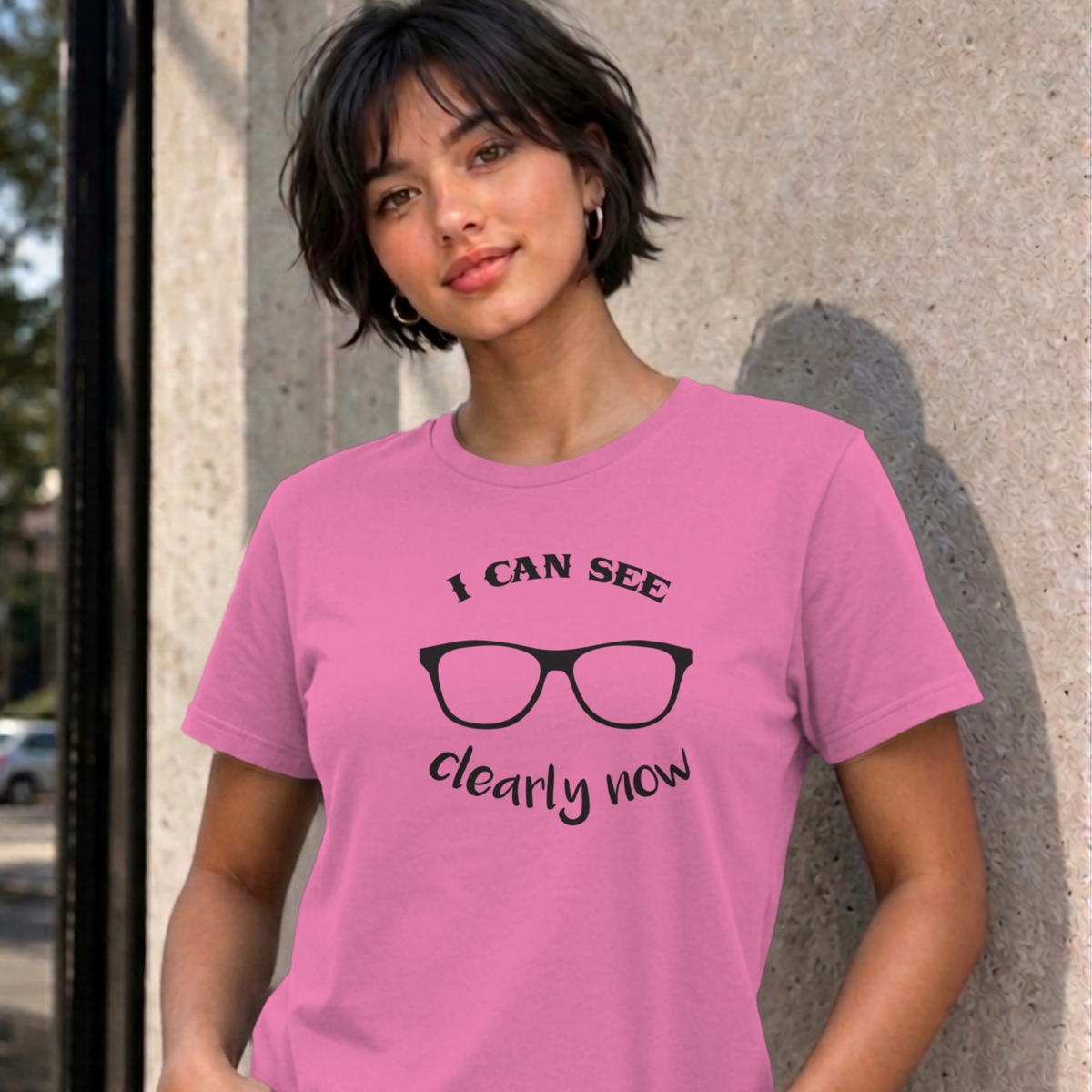 Woman wearing the azalea I Can See Clearly Now graphic tee