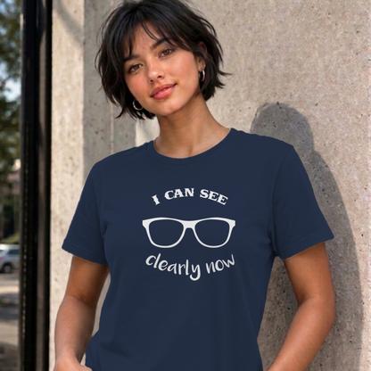 Woman wearing the navy I Can See Clearly Now graphic tee