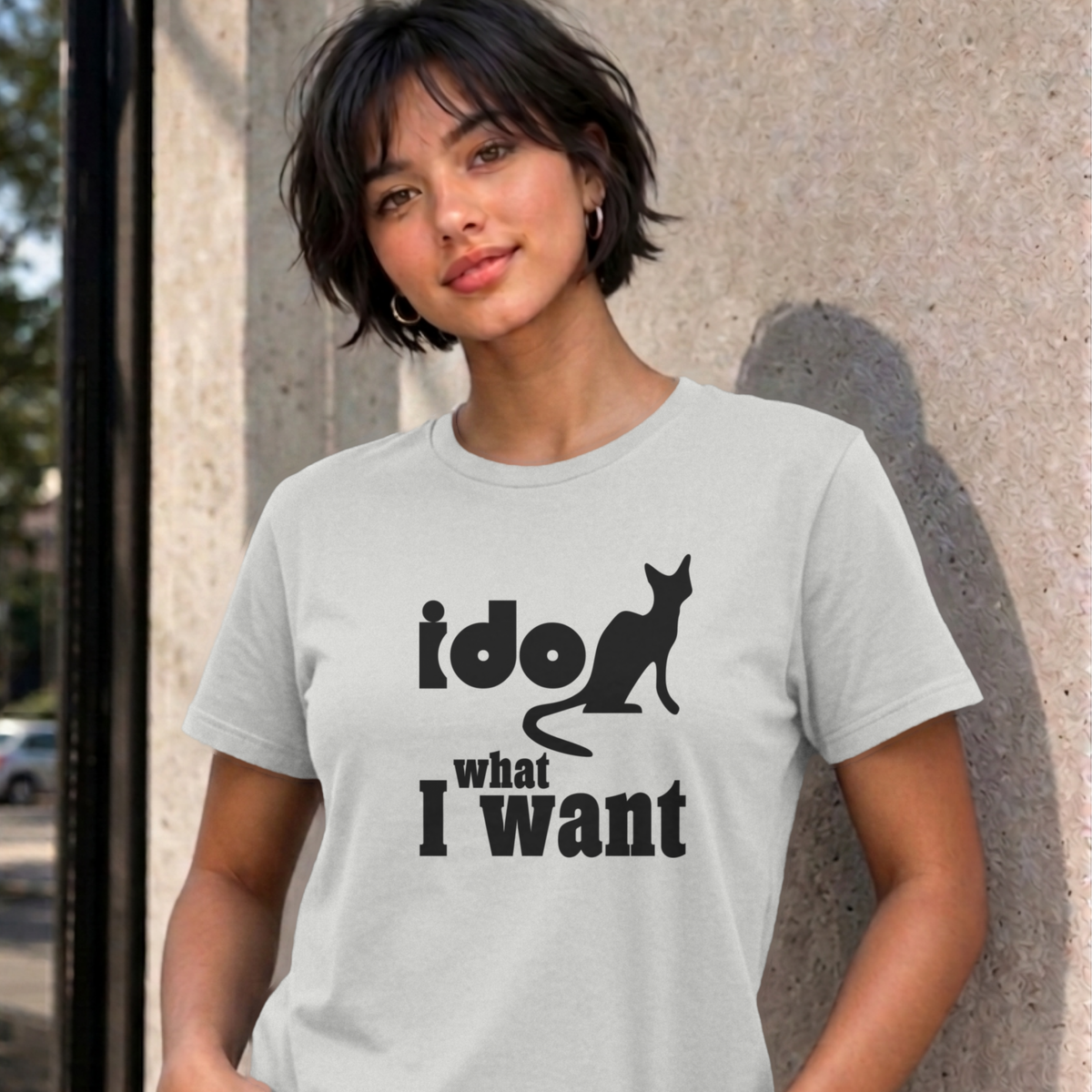 Woman wearing the ash I Do What I Want graphic tee