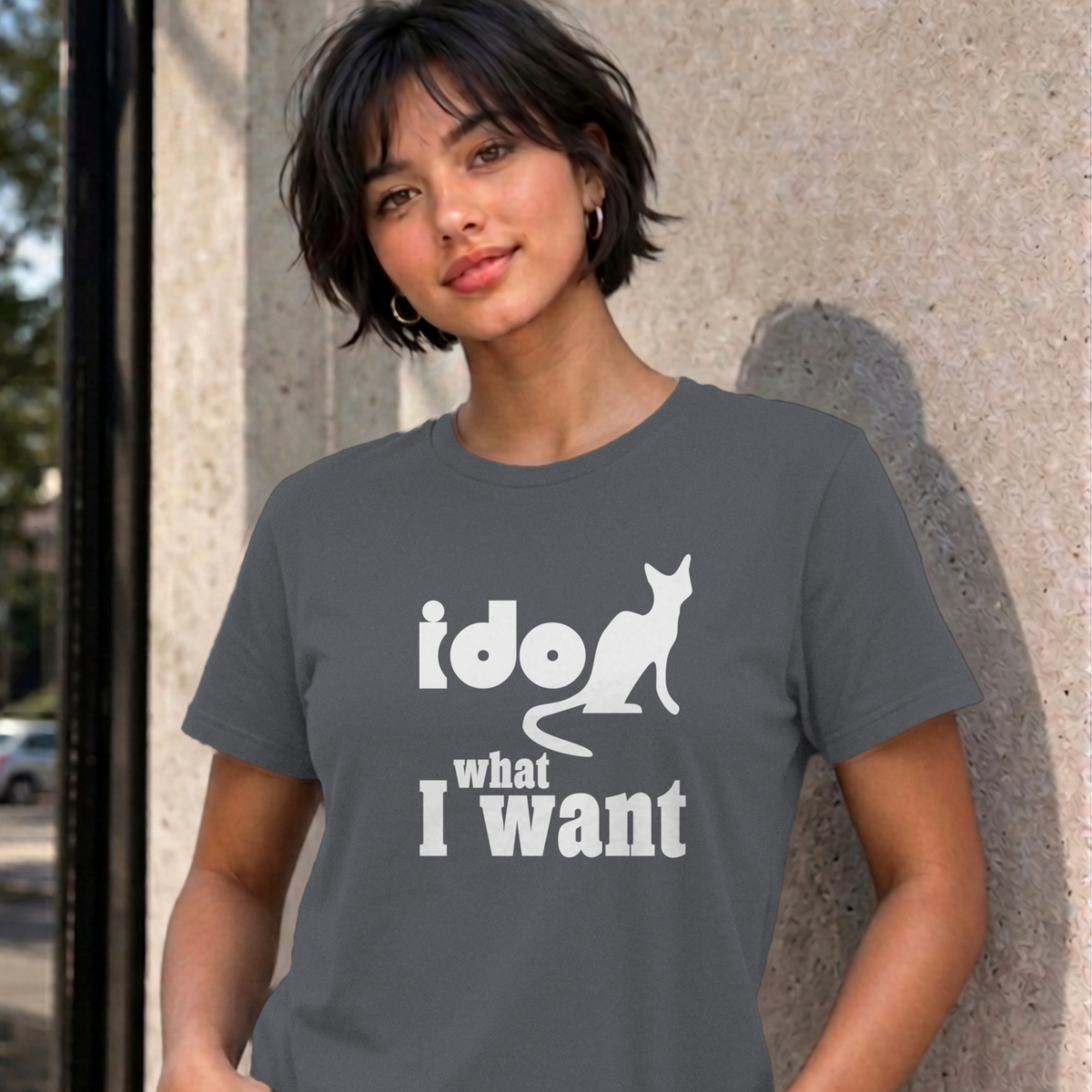 Woman wearing the charcoal I Do What I Want graphic tee