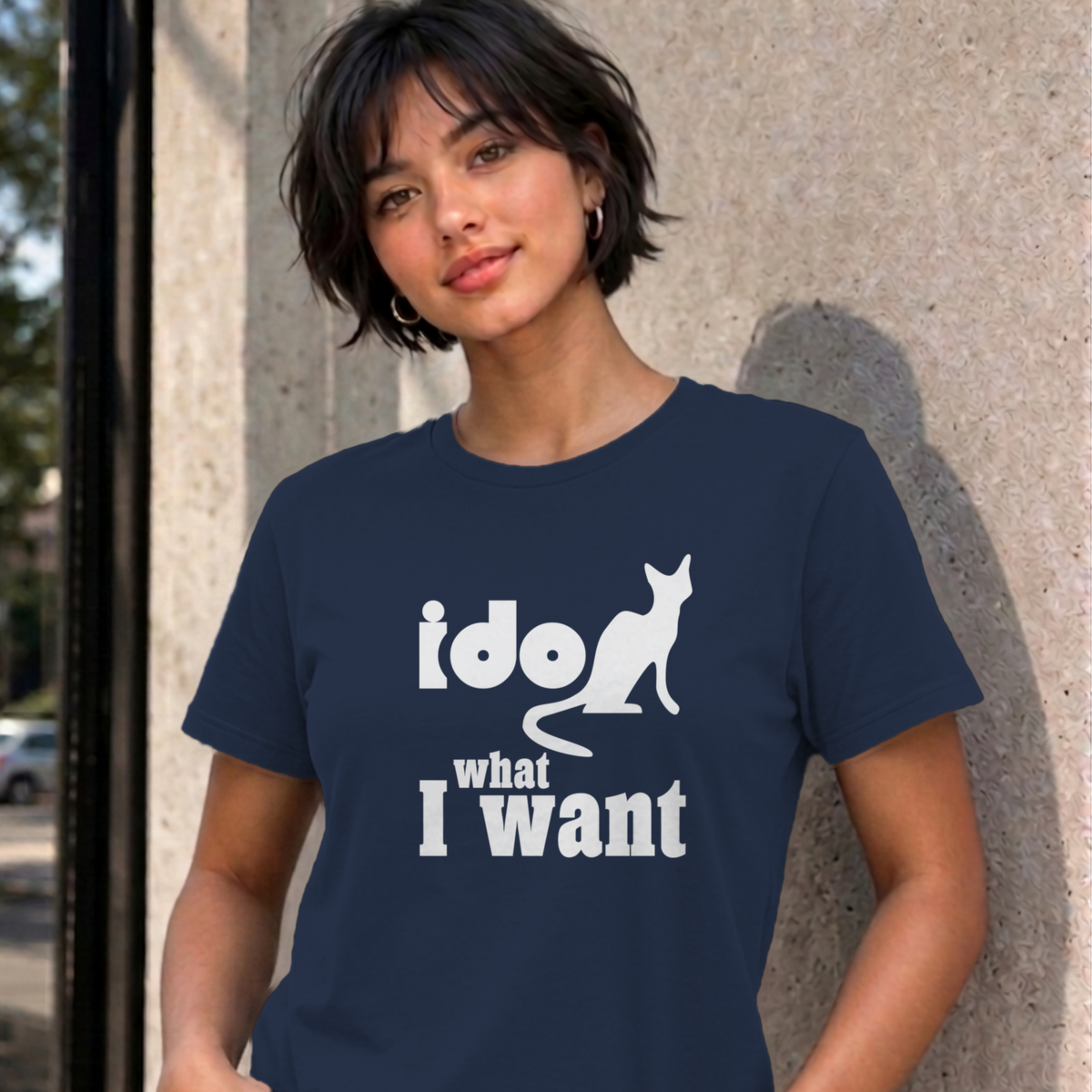 Woman wearing the navy I Do What I Want graphic tee