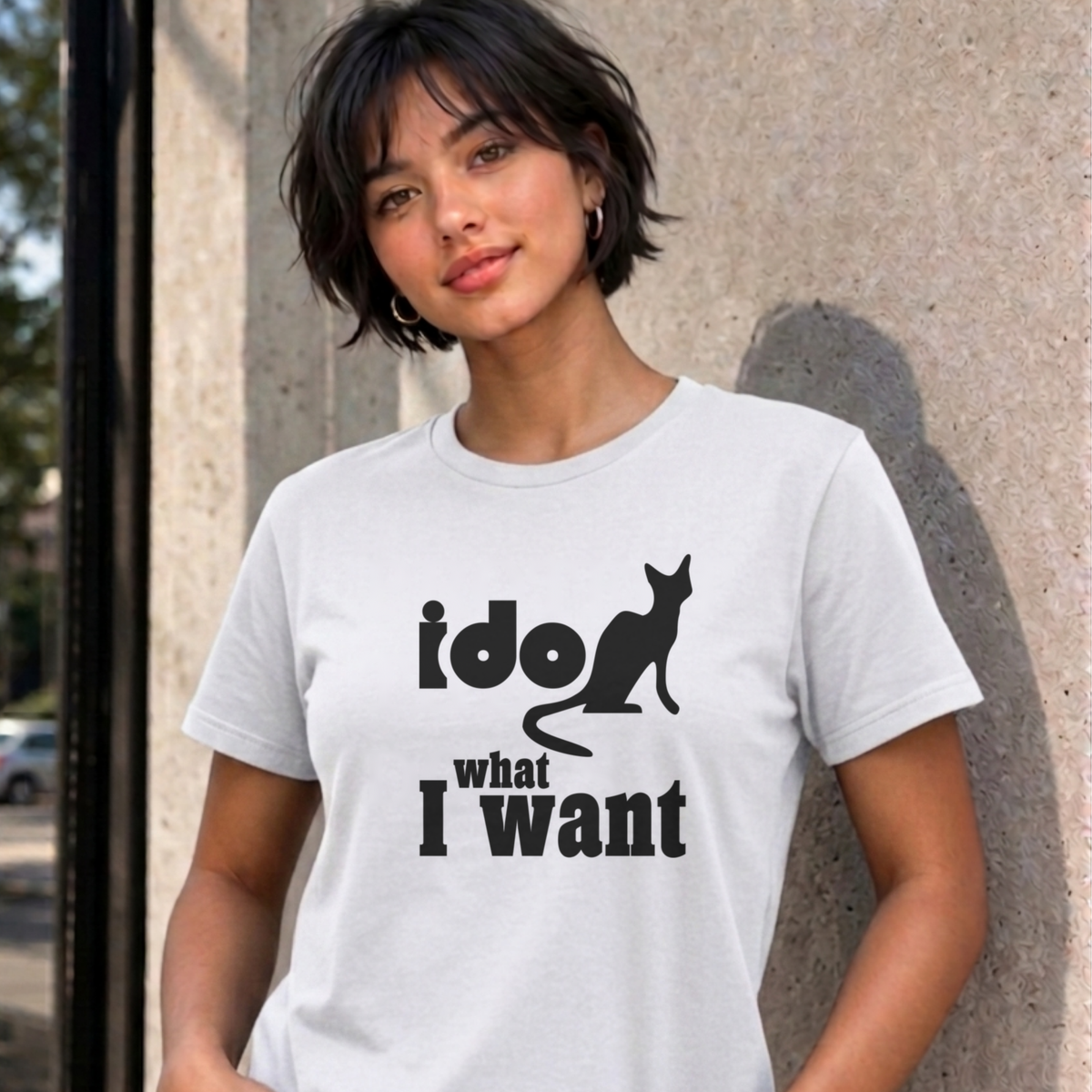 Woman wearing the white I Do What I Want graphic tee