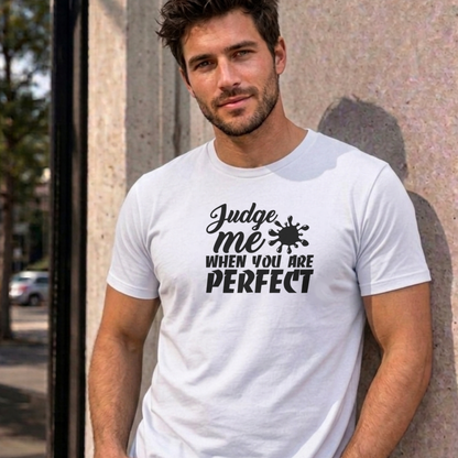 Man wearing the white Judge Me When You Are Perfect graphic tee