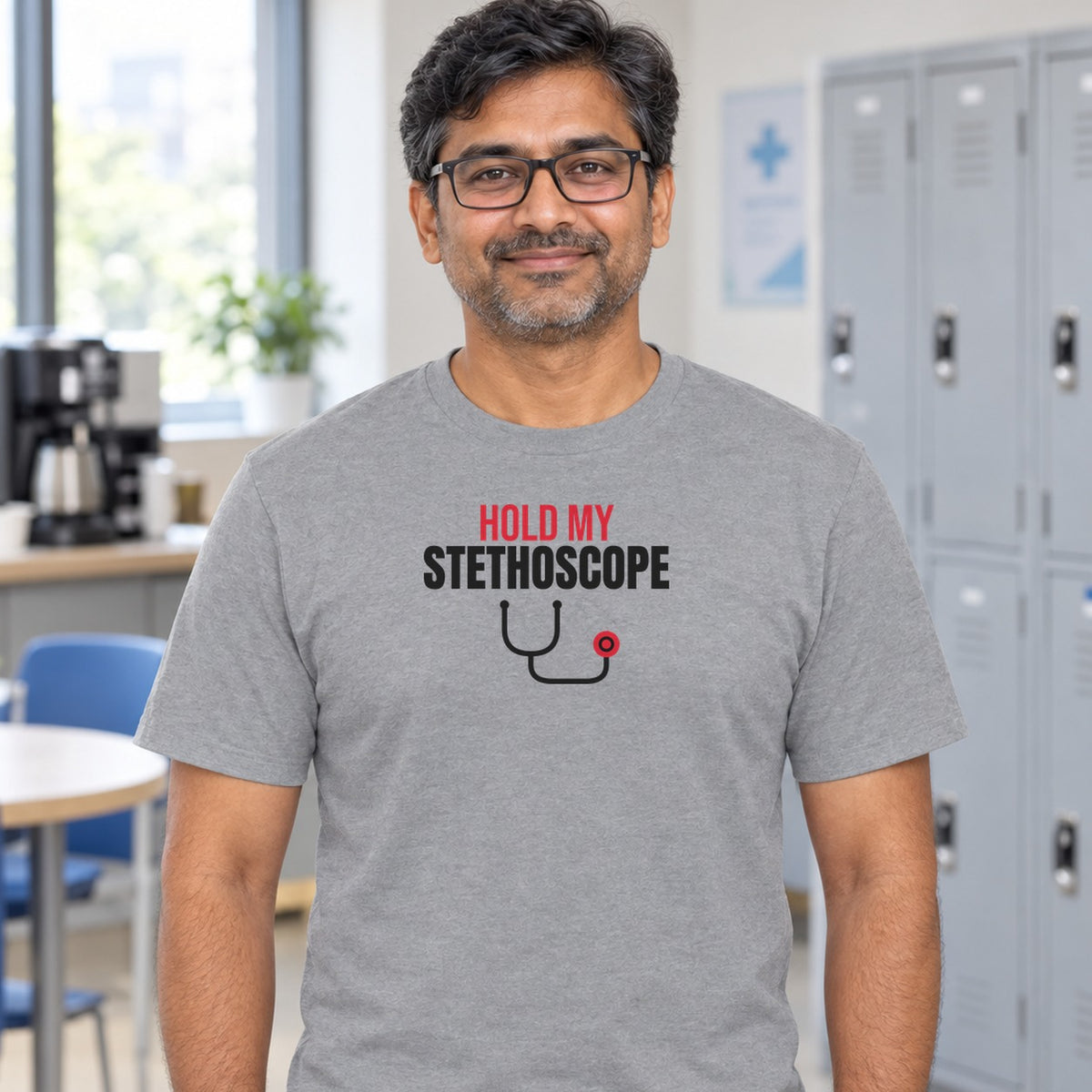 Man wearing the sport grey Hold My Stethoscope graphic tee