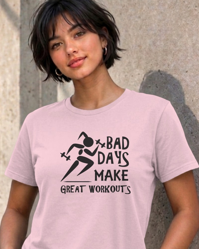 Woman wearing the light pink Bad Days Make Great Workouts graphic tee