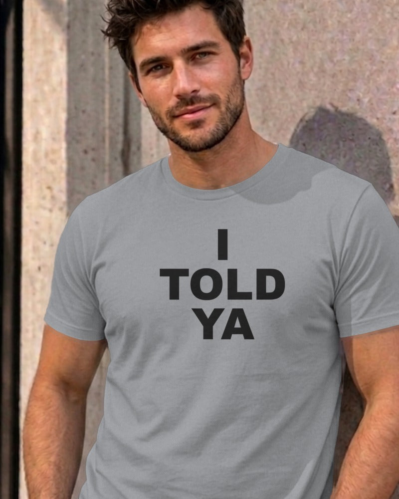 Man wearing the sport grey I Told Ya graphic tee
