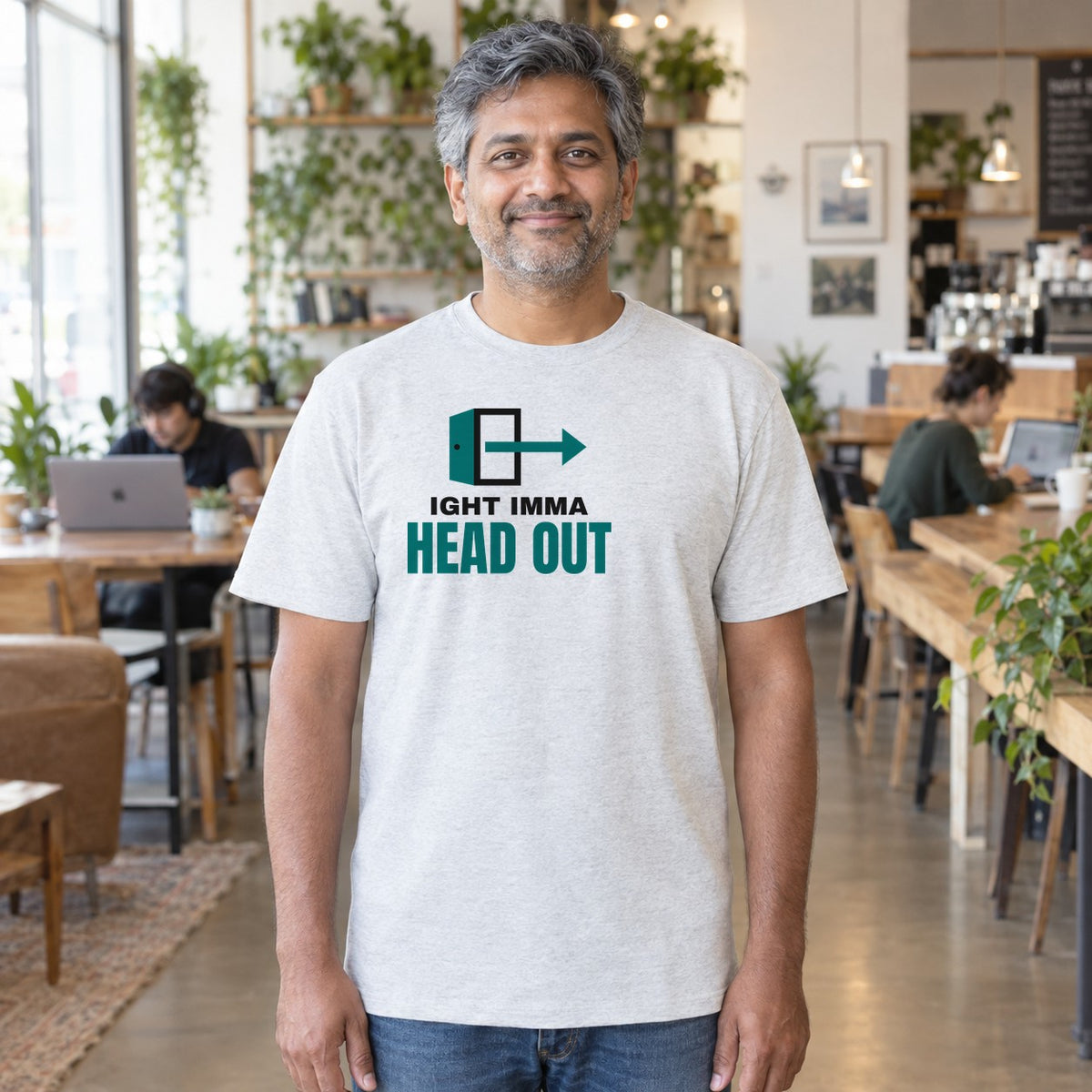 Man wearing the ash Ight Imma Head Out graphic tee