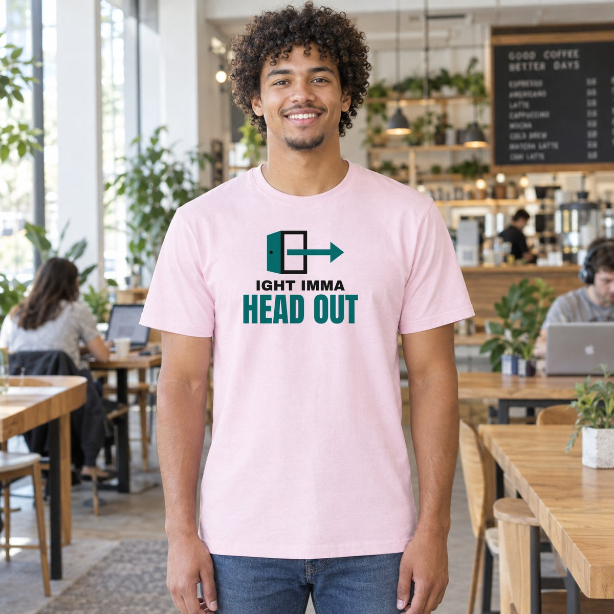 Man wearing the light pink Ight Imma Head Out graphic tee