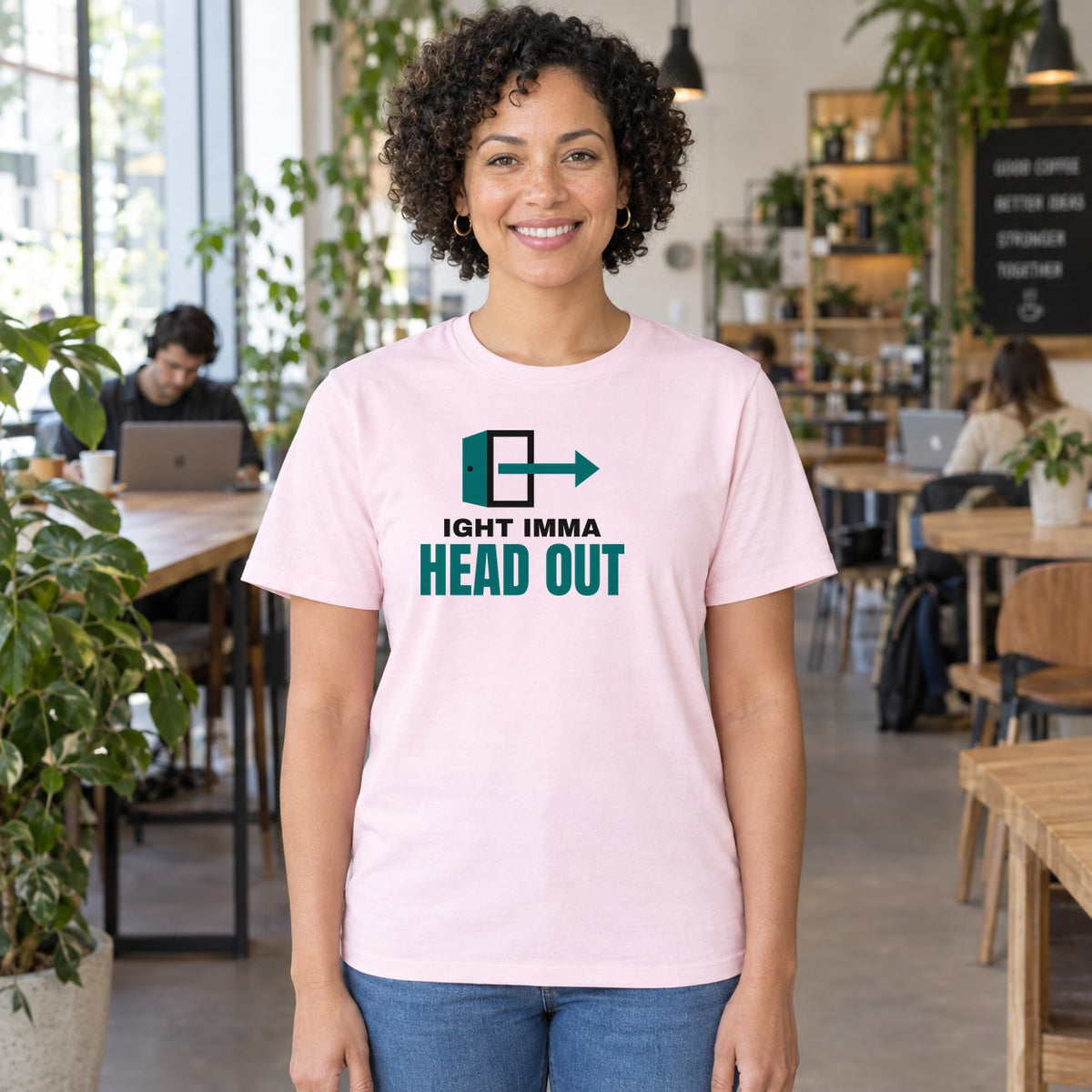 Woman wearing the light pink Ight Imma Head Out graphic tee