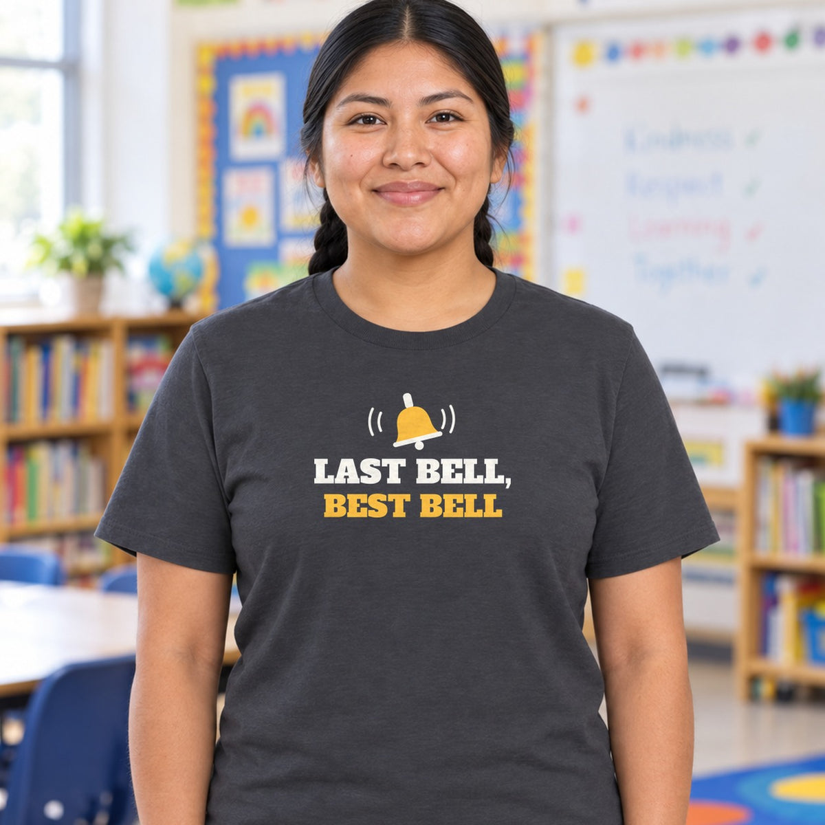 Woman wearing the charcoal Last Bell, Best Bell graphic tee
