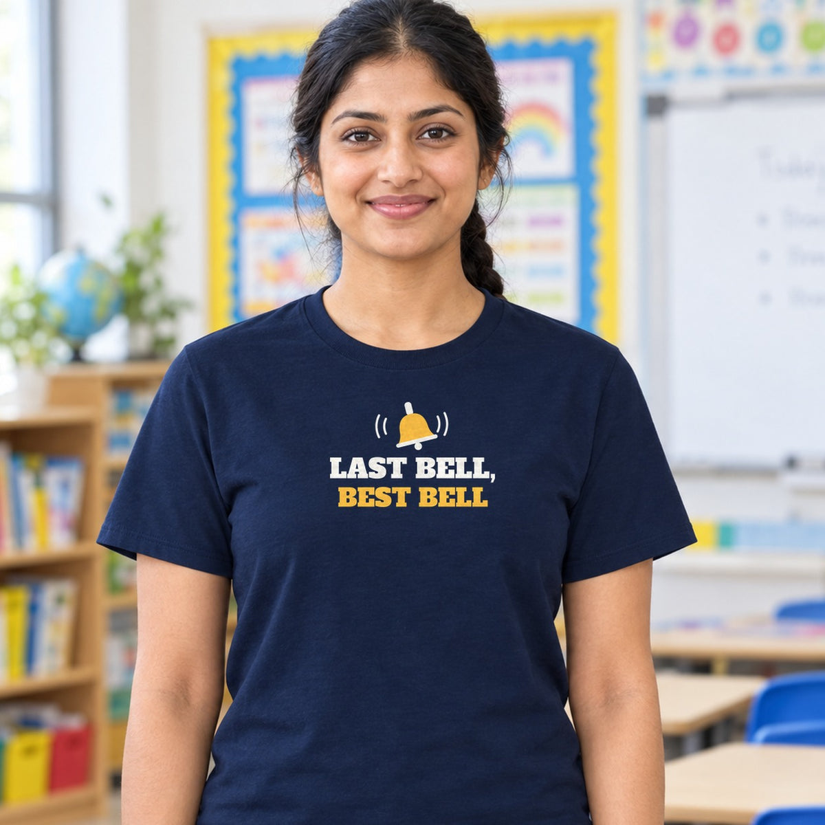 Woman wearing the navy Last Bell, Best Bell graphic tee