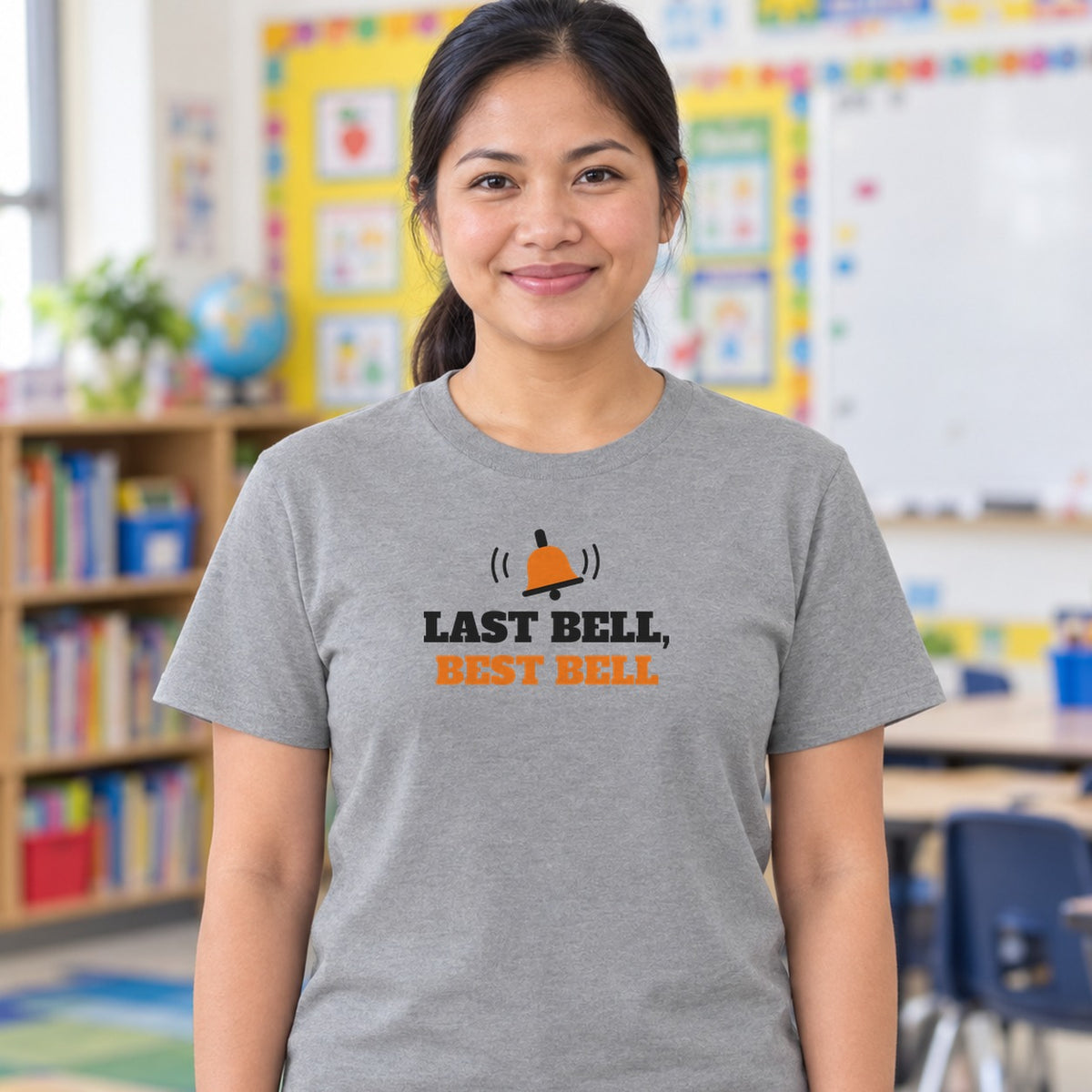 Woman wearing the sport grey Last Bell, Best Bell graphic tee