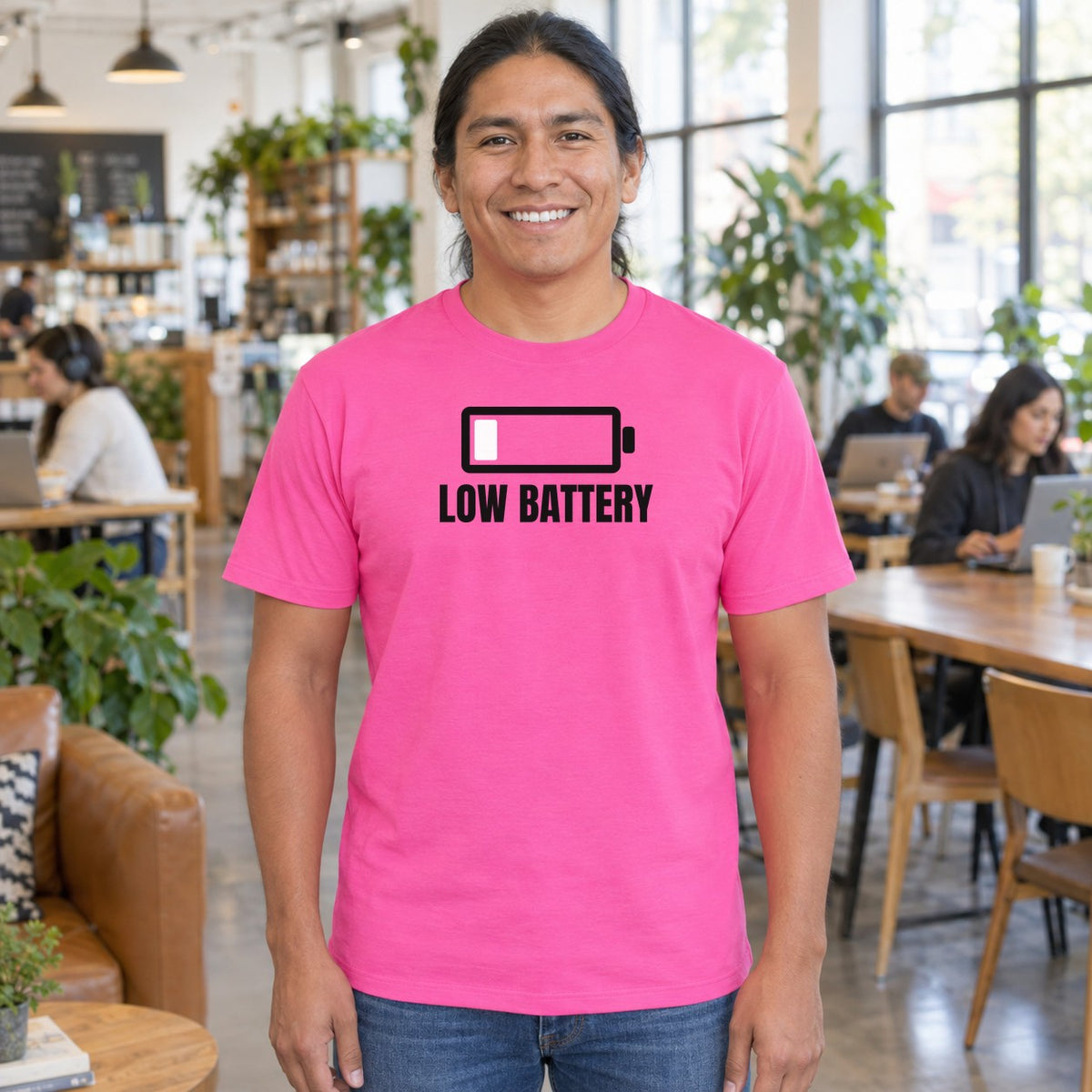 Man wearing the azalea Low Battery graphic tee