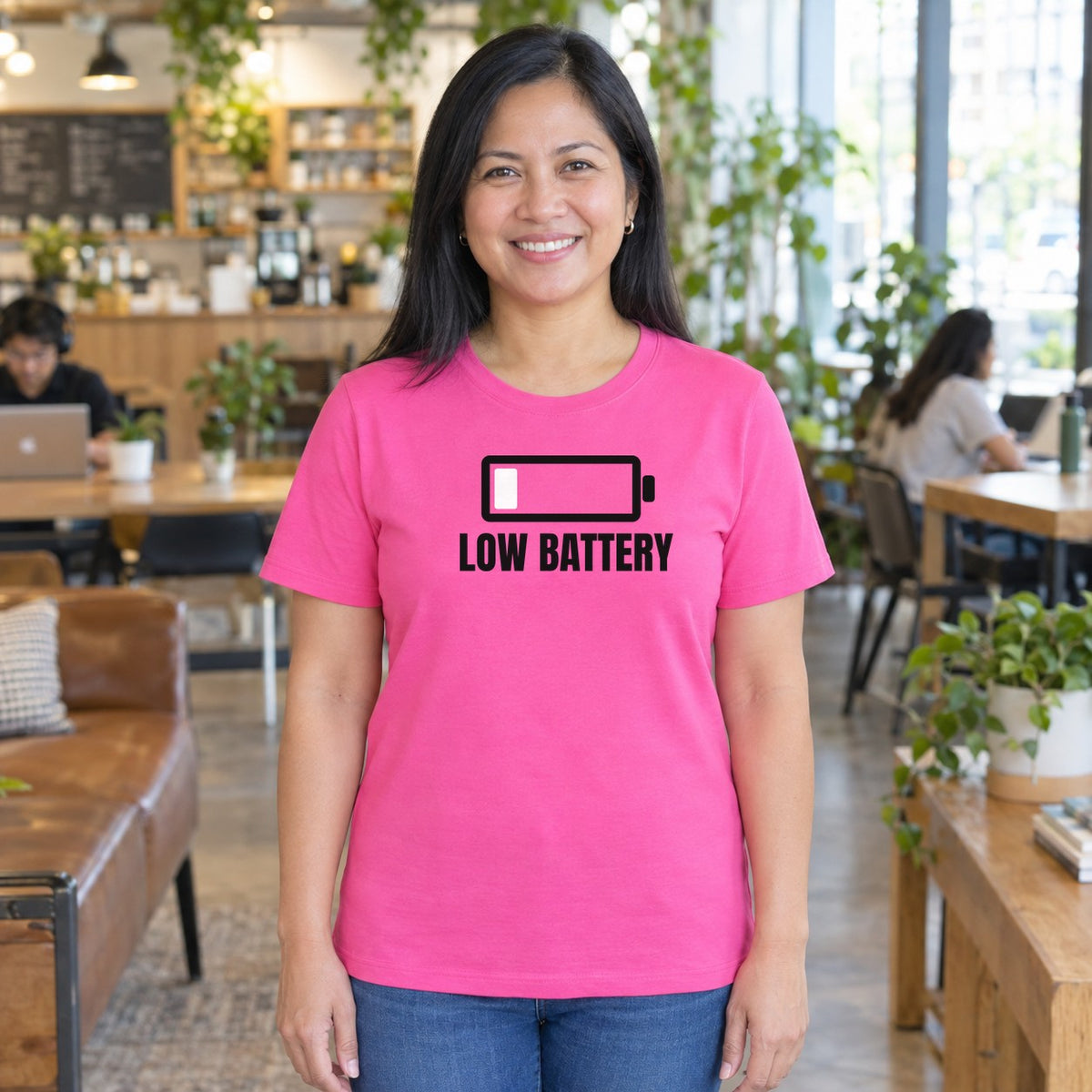 Woman wearing the azalea Low Battery graphic tee