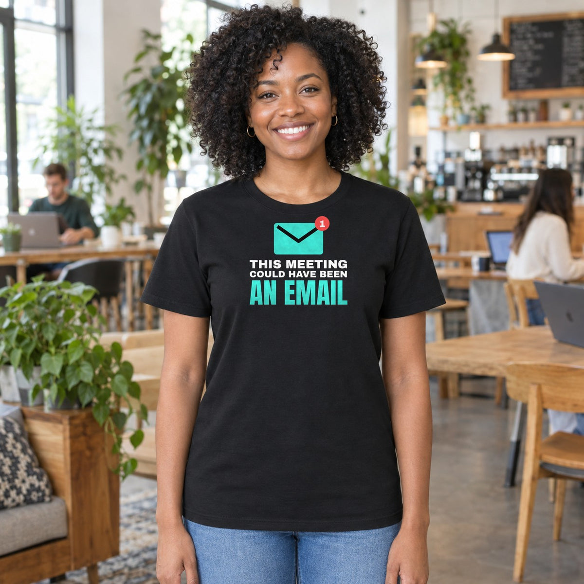 Woman wearing the black Could Have Been an Email graphic tee