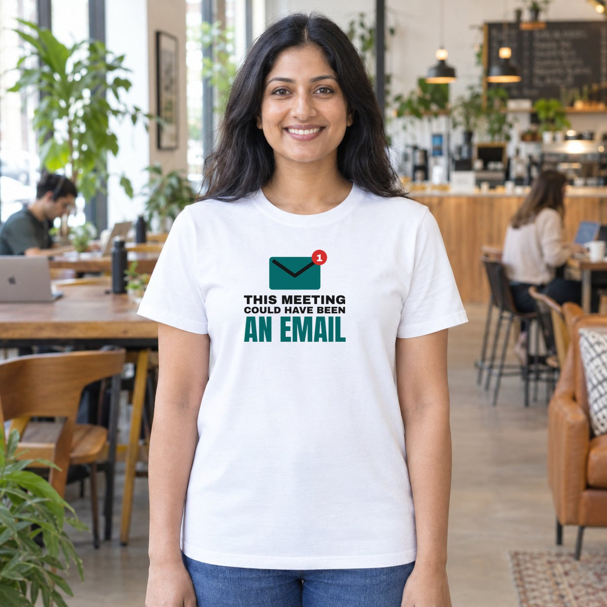 Woman wearing the white Could Have Been an Email graphic tee